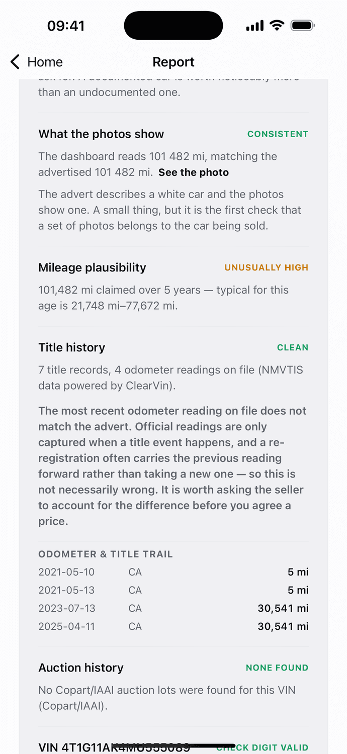 Official NMVTIS title history: clean title, 7 title records and a four-reading odometer and title trail, with the auction history check beneath